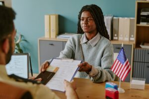 African American Woman Having Visa Interview